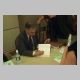 Ralph Nader signs my copy of Crashing the Party